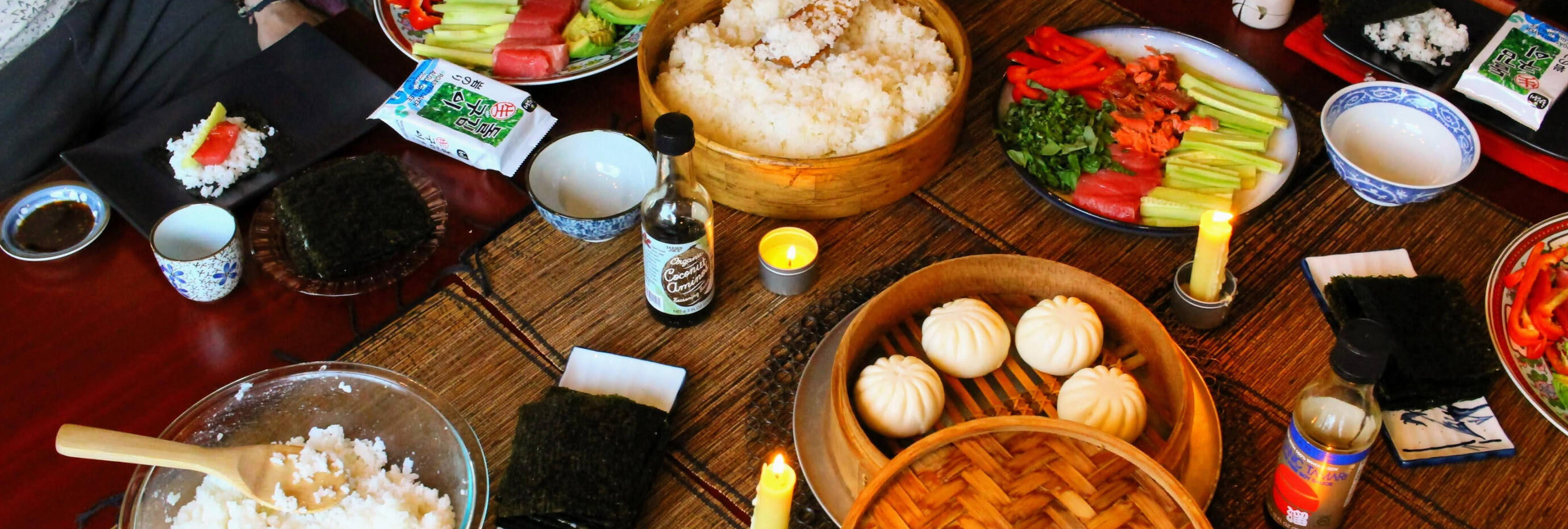 A table spread with a Japanese-style feast.